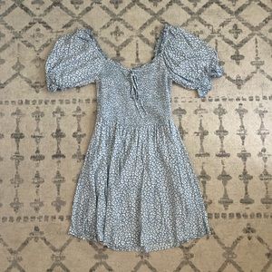 Super cute cheetah print mini dress with puff sleeves and tighter fit top.